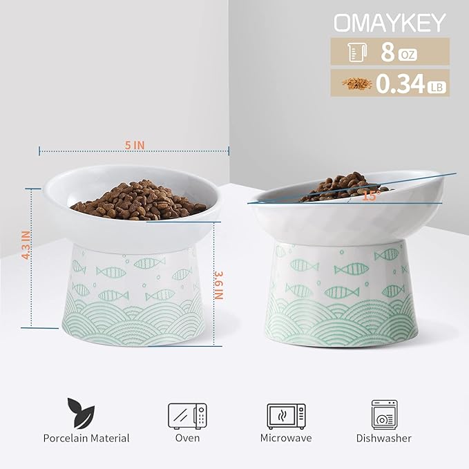 OMAYKEY Ceramic Raised Cat Bowls, Elevated Tilted Cat Food and Water Bowl Set, Porcelain Stress Free Pet Feeder Dish for Cats and Small Dogs, Dishwasher and Microwave Safe, Green, Set of 2